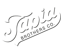Tapia Brothers logo in white